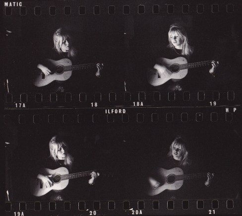 Brigitte Bardot, playing the guitar