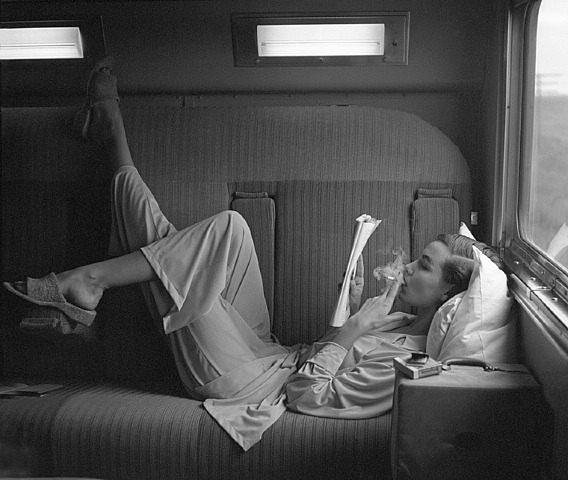 Lillian Bassman, smoking on the train, pyjamas